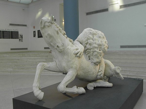 Lion attaquant un cheval